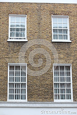 Georgian windows architecture on a wall house, London, UK Stock Photo