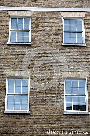 Georgian windows architecture on a wall house, London Stock Photo