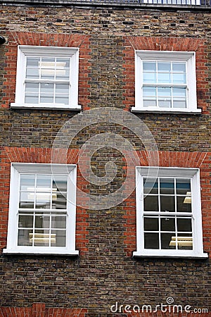 Georgian windows architecture on a wall house, London, UK Stock Photo