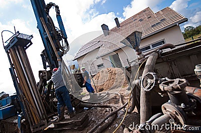 Geothermal drilling for house Stock Photo