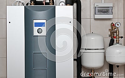 Geothermal furnace for a private house Technical room detail Stock Photo