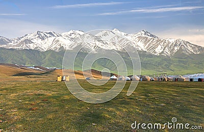 The ger camp in a large meadow at Song kul lake , Naryn of Kyrgyzstan Stock Photo