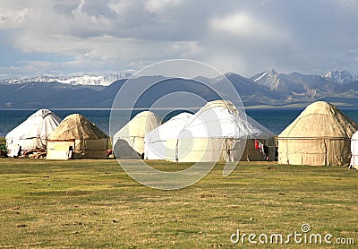 The ger camp in a large meadow at Song kul lake , Naryn of Kyrgyzstan Stock Photo