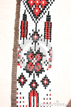 Gerdan is a women`s beaded jewelry. Ukrainian women use folk patterns, ancient symbols when weaving gerdans. Stock Photo
