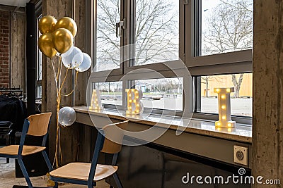 German Abitur Graduation party room decoration and Award sculptures red carpet preparations for surprise party Editorial Stock Photo