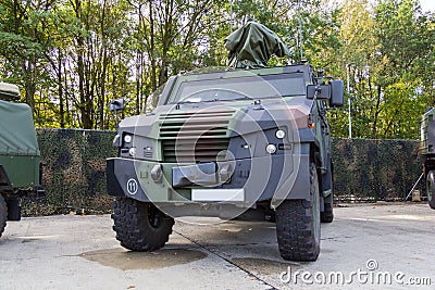 German armored military police vehicle stands on platform Stock Photo