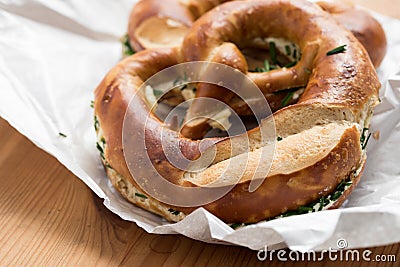 German Brezel pretzel with chives and butter Stock Photo