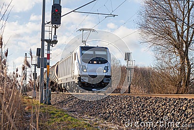 German cargo train drives on tracks Editorial Stock Photo