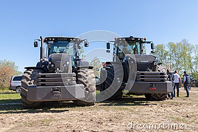 German claas xerion and axion tractors stands on track Editorial Stock Photo
