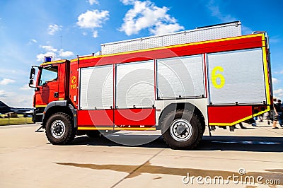 German fire service truck stands on airfield Stock Photo