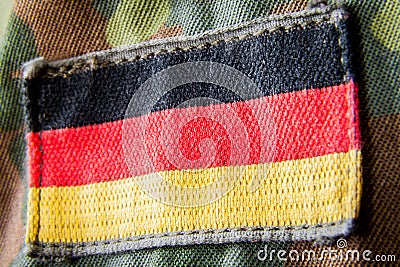German flag appliquÃ©d on military jacket Stock Photo