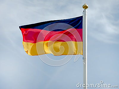 German flag waving in the wind in a gentle breeze Stock Photo