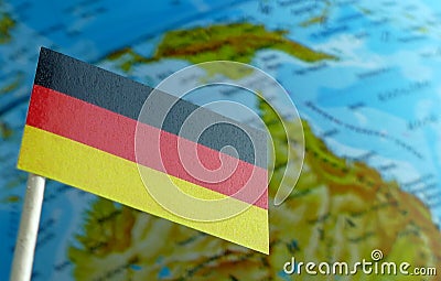 German flag with a globe map as a background Stock Photo