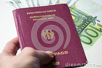 German international traveling passport and euro money. Stock Photo