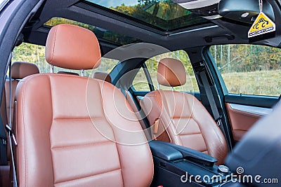 German luxurious limousine - brown leather interior, big panoramic sunroof, sport equipment Editorial Stock Photo