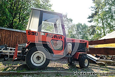 German-made compact utility tractor Agria 590. Heavily used, parked on a yard. Editorial Stock Photo