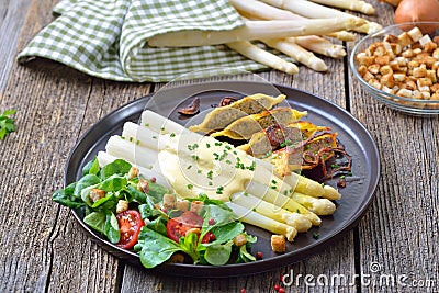 German meal with asparagus Stock Photo
