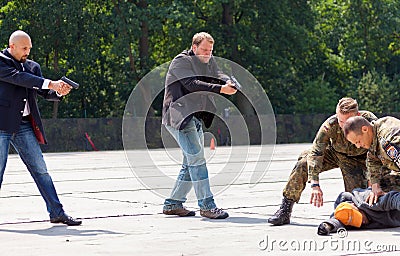 German military police bodyguards defeats an assassin Editorial Stock Photo