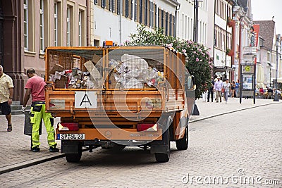 German people sweeper working clean and keep garbage and garbage truck at Speyer town Editorial Stock Photo