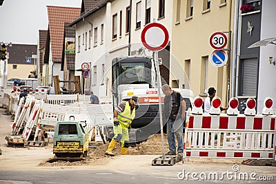 German people workers use heavy machinery motor working made and build road in construction site Editorial Stock Photo