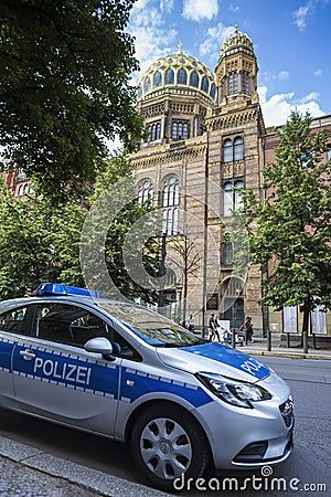 German police car in front of the old berlin synagogue germany Editorial Stock Photo