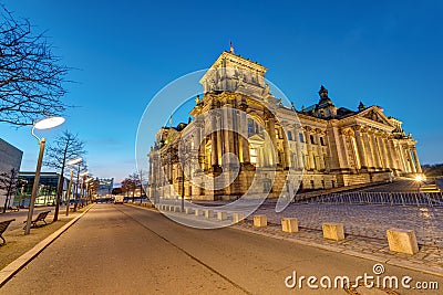 The german Reichstag in Berlin before sunrise Stock Photo