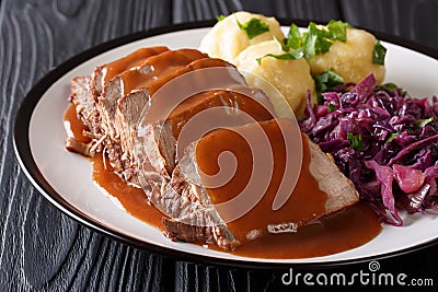 German Sauerbraten is a beef stew with a spicy sauce served with Stock Photo