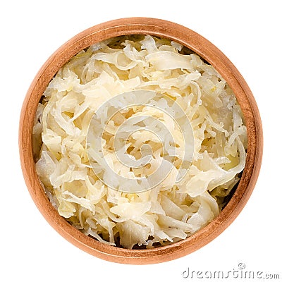 German sauerkraut in wooden bowl over white Stock Photo