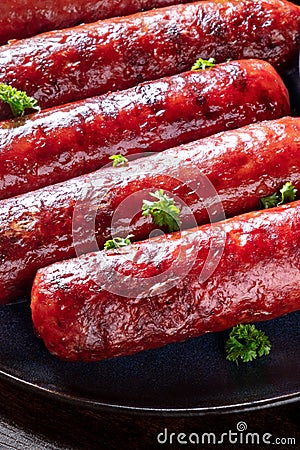 German sausages with parsley, a close-up shot of a portion. Stock Photo