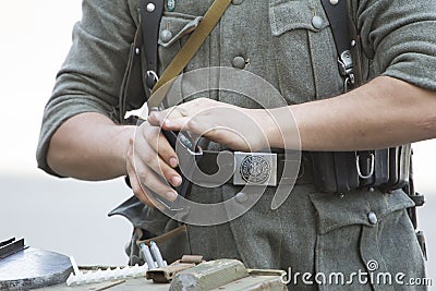 German soldier of the second world war charges military cartridges Editorial Stock Photo