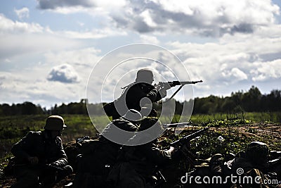 German soldiers. Historical reconstruction, soldiers fighting during World War II. Editorial Stock Photo