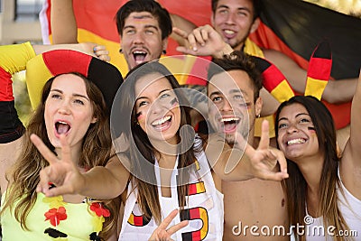 German sport soccer fans celebrating victory. Stock Photo