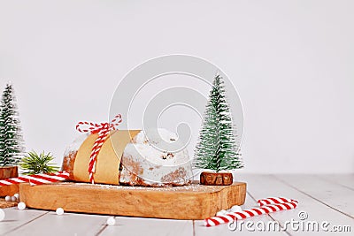 German Stollen cake, a fruit bread with nuts, spices, and dried fruits Stock Photo