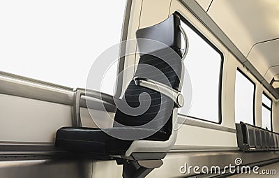 Train interior. Bright train windows and a chair. Train wagon Stock Photo
