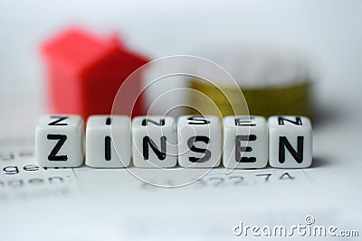 German Word INTEREST formed by alphabet blocks: ZINSEN Stock Photo
