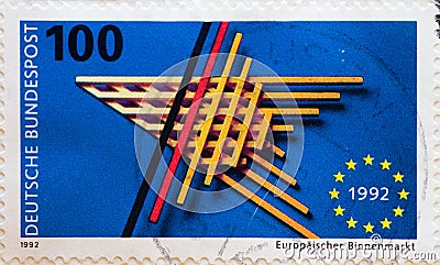 GERMANY - CIRCA 1992 : a postage stamp from Germany, showing the European emblem and five-pointed EU star, made of bars. European Editorial Stock Photo