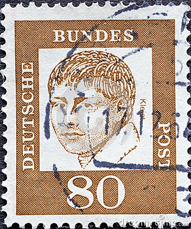 GERMANY - CIRCA 1961: a postage stamp from Germany, showing a portrait of the important German playwright, narrator, poet Heinrich Editorial Stock Photo