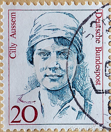 GERMANY - CIRCA 1988 : a postage stamp from Germany, showing a woman from German history the tennis player and Wimbledon winner Ci Editorial Stock Photo