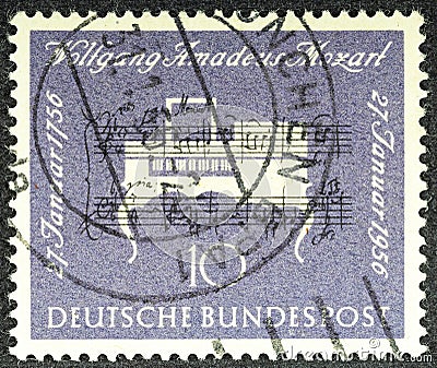 GERMANY - CIRCA 1956: a stamp printed in the Germany shows Clavichord, 200th Anniversary of the Birth of Wolfgang Editorial Stock Photo