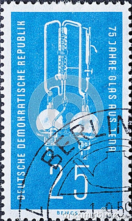 GERMANY, DDR - CIRCA 1959 : a postage stamp from Germany, GDR showing a laboratory bi-distillation apparatus made of fireproof Jen Editorial Stock Photo