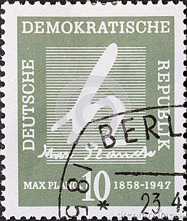 GERMANY, DDR - CIRCA 1958 : a postage stamp from Germany, GDR showing the symbol of Planck`s quantum of action, signature of the Editorial Stock Photo