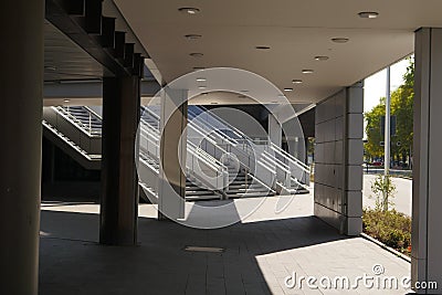 Staircases made of concrete and covered and illuminated open-air walkways Editorial Stock Photo