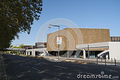 Facade and entrance of the CCD town hall, access road with green plants on Editorial Stock Photo