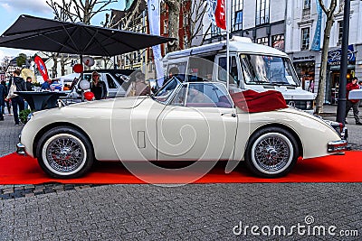 GERMANY, LIMBURG - APR 2017: ivory JAGUAR XK120 XK140 XK150 ROADSTER CABRIO 1948 in Limburg an der Lahn, Hesse, Germany Editorial Stock Photo