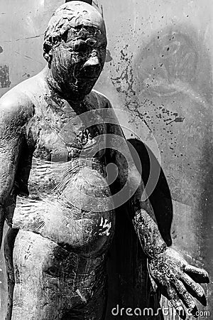 Germany, Luebeck, June 19, 2017, Bronze statue with the name, revolving door, in the pedestrian zone in Luebeck Editorial Stock Photo