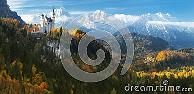 Germany. Panorama. The famous Neuschwanstein Castle and Hohenschwangau Castle on the background of snowy mountains. Editorial Stock Photo