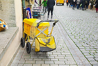 Germany, Rothenburg, fairy tale town, old street, postman car Editorial Stock Photo