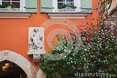 Germany, Rothenburg, fairy tale town, old streets, businesses, green walls Editorial Stock Photo