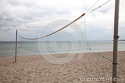 Germany, Schleswig-Holstein, Baltic Sea, volleyball net on beach Stock Photo