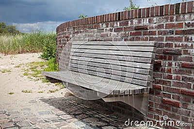 Germany, Schleswig-Holstein, wall and bench Stock Photo